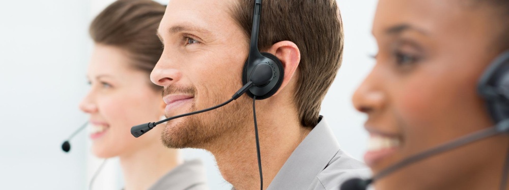 Man in call centre with headset